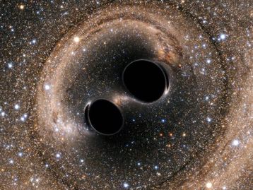 Choque de buracos negros gera mais ondas gravitacionais do que se pensava