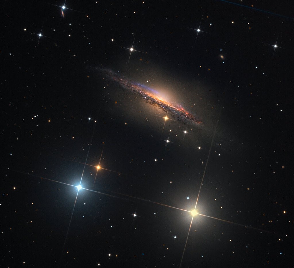 Astrofotografia da galáxia espiral NGC 1055.