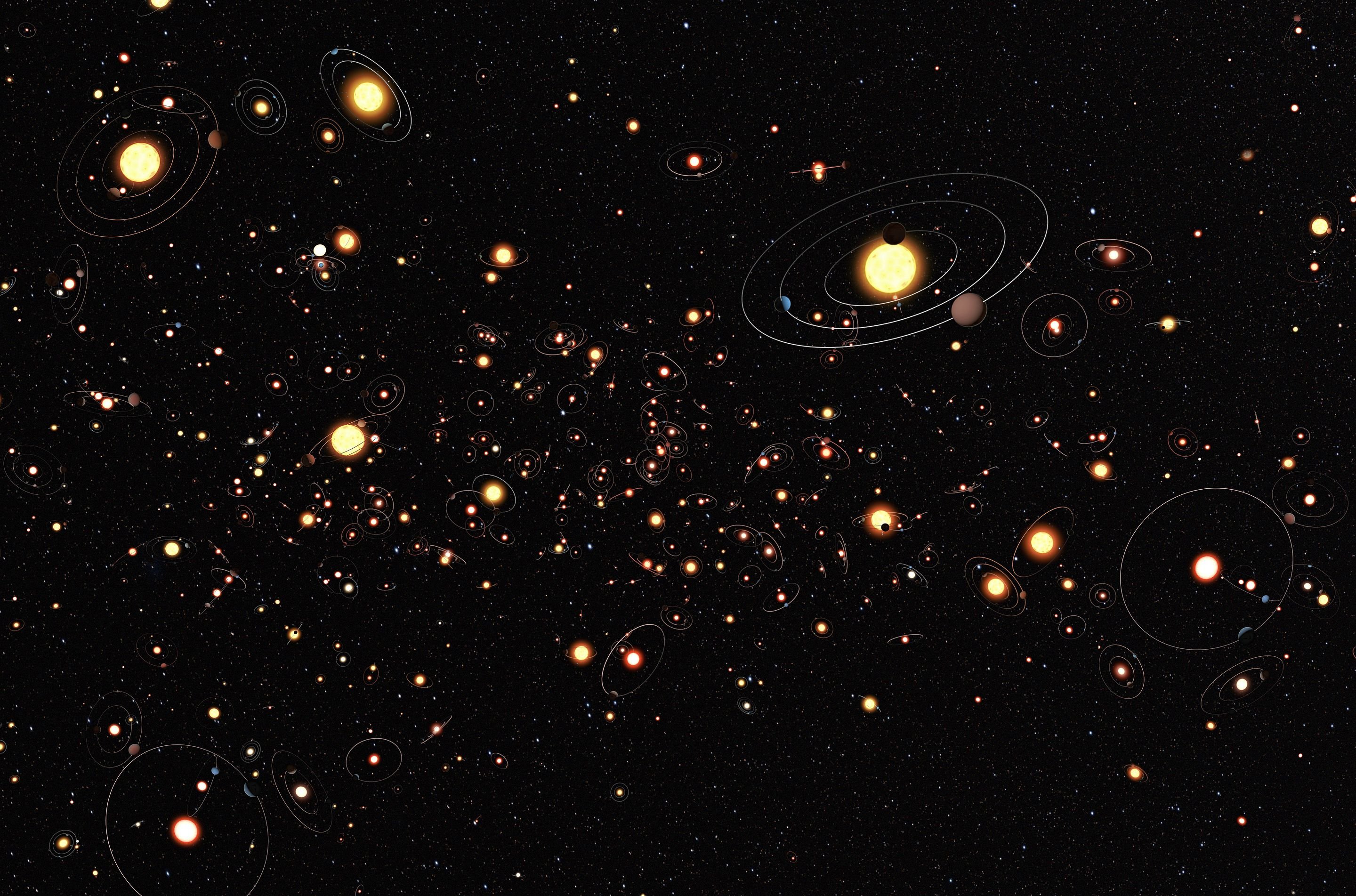 Impressão artística de vários sistemas planetários, com estrelas de diferentes tamanhos e diferentes configurações orbitais.