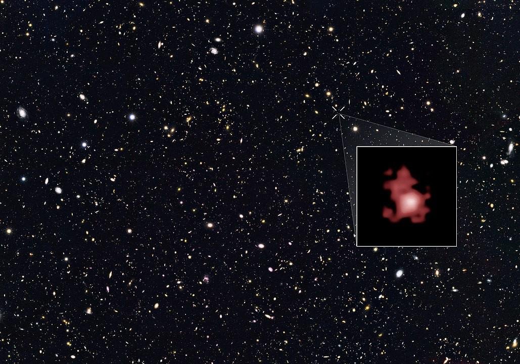 Imagem de galáxia que nasceu há aproximadamente 13.8 bilhões de anos, poucos anos após o Big Bang.