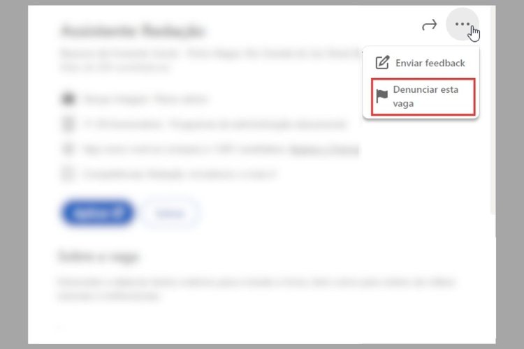 Para denunciar, clique nos três pontinhos ao lado do título da vaga.