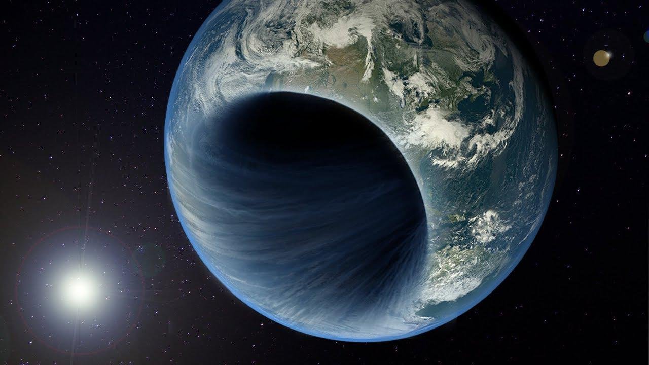 Representação artística da transformação da Terra em um buraco negro.