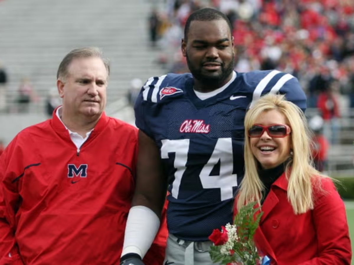 Michael Oher e seus "pais adotivos", Sean e Leigh Anne Tuhony.