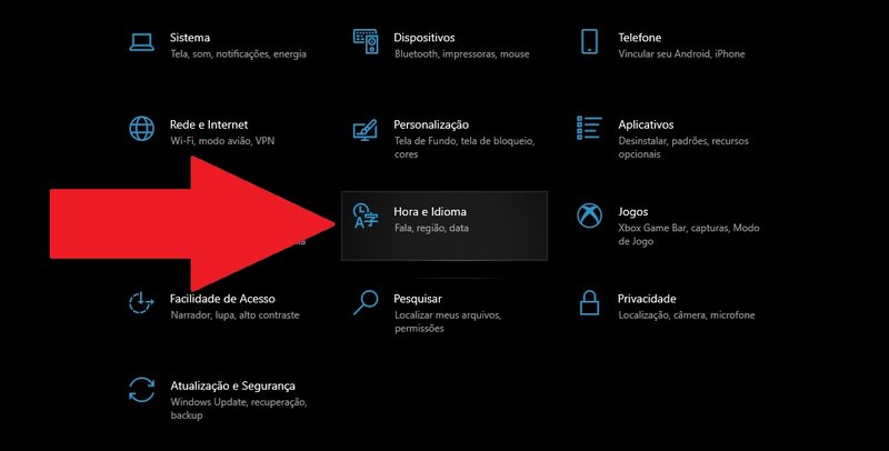 Selecione a opção "Hora e Idioma" para começar o processo de mudança de região do seu sistema.