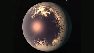 Um exemplo de exoplaneta semelhante a um globo ocular com um oceano de um lado e uma concha gelada do outro.