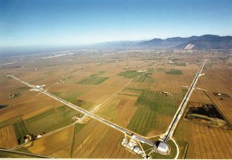 Aerial view of the Virgo gravitational wave interferometer in Italy.