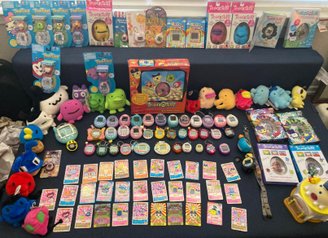 A collection of Tamagotchis displayed on fan forums.