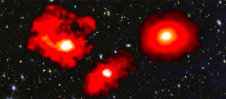 Os três monstros vermelhos são galáxias massivas e empoeiradas no primeiro bilhão de anos após o Big Bang. (Fonte: NASA/CSA/ESA/JWST Archive)