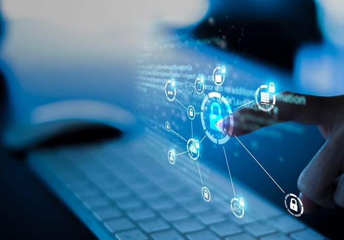 O que é VNC e para que serve essa tecnologia? Controlar um computador a milhares de quilômetros de distância, como se estivesse sentado em frente a ele, é algo que as tecnologias de acesso remoto proporcionam, permitindo realizar diferentes tipos de trabalhos. O VNC é uma dessas ferramentas. ilustracao-de-cadeado-virtual-em-cima-de-um-teclado